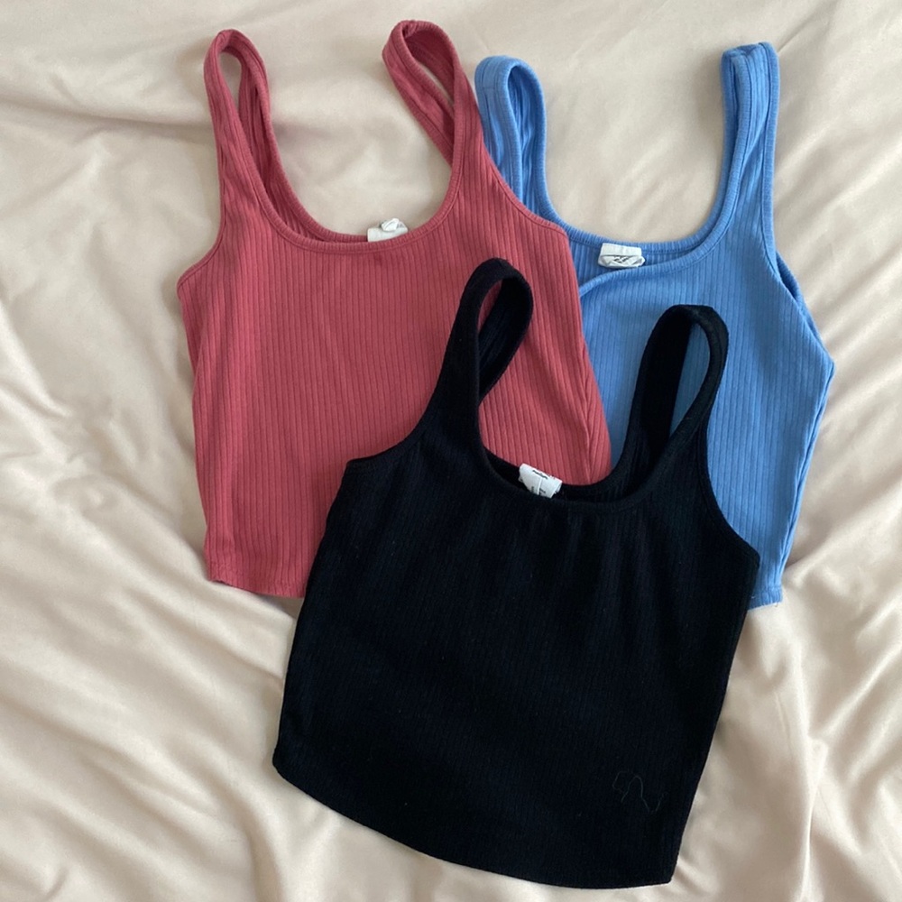 3 cropped tanks